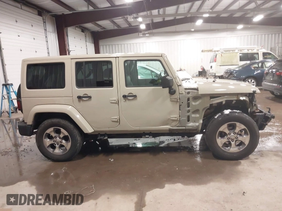 2018 Jeep Wrangler JK Unlimited Sahara with VIN 1C4HJWEG4JL803516, listed as a IAAI auction lot 41127652 with 85,749 mi miles. Bid and sale history available at carsss.com. Image 14.