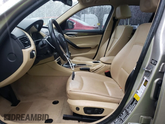 2014 BMW X1 xDrive28i with VIN WBAVL1C52EVY15236, listed as a Copart auction lot 50140885 with 141,088 mi miles and Salvage Title. Bid and sale history available at carsss.com. Image 7.