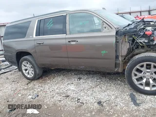 2015 GMC Yukon XL SLT with VIN 1GKS2HKC6FR582574, listed as a IAAI auction lot 41187550 with 185,737 mi miles. Bid and sale history available at carsss.com. Image 14.