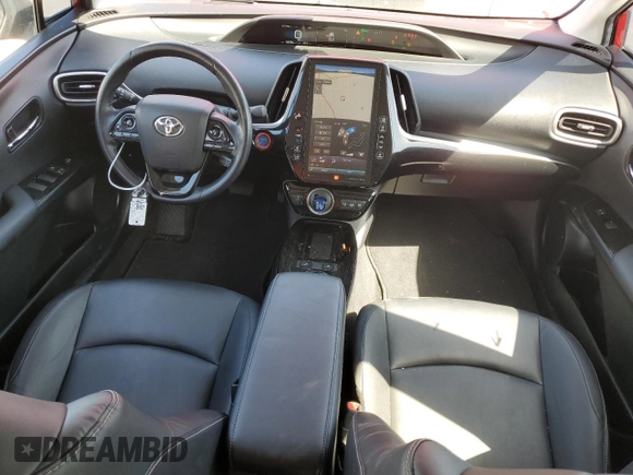 2021 Toyota Prius LE with VIN JTDKAMFP8M3179507, listed as a Copart auction lot 52571255 with 88,966 mi miles and Salvage Title. Bid and sale history available at DreamBid. Image 8.