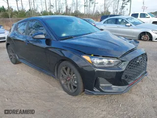 2019 Hyundai Veloster Turbo with VIN KMHTH6AB9KU005942, listed as a IAAI auction lot 41565229 with 91,788 mi miles. Bid and sale history available at carsss.com. Image 1.