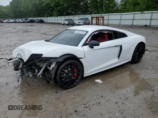 2018 Audi R8 V10 z VIN WUABAAFX5J7902445, wystawiony jako Copart lot #56587934 z przebiegiem Nie podano mil oraz Szkody całkowita. Historia ofert i sprzedaży dostępna na DreamBid. Obrazek 1.