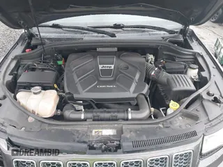 2015 Jeep Grand Cherokee Summit with VIN 1C4RJFJM6FC955904, listed as a IAAI auction lot 41483446 with 65,970 mi miles. Bid and sale history available at carsss.com. Image 10.