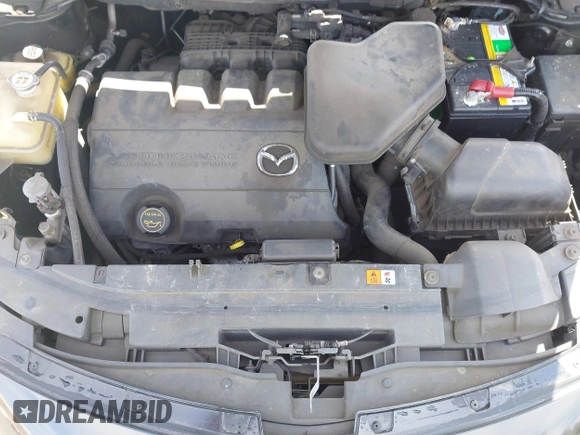 2015 Mazda CX-9 Grand Touring z VIN JM3TB2DA4F0450014, wystawiony jako IAAI lot #41692935 z przebiegiem 90 800 mil mil oraz . Historia ofert i sprzedaży dostępna na DreamBid. Obrazek 10.