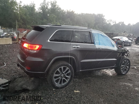 2017 Jeep Grand Cherokee Overland with VIN 1C4RJFCG4HC730861, listed as a Copart auction lot 62918825 with 77,228 mi miles and Salvage title. Bid and sale history available at DreamBid. Image 3.