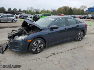 2018 Honda Civic Sedan EX-L with VIN 19XFC1F74JE001754, listed as a Copart auction lot 50705965 with 124,084 mi miles and Salvage Title. Bid and sale history available at carsss.com. Image 1.