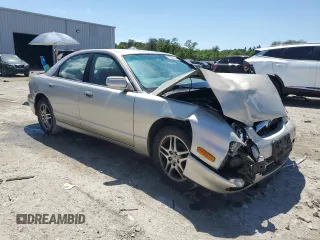 2000 Mazda Millenia with VIN JM1TA2210Y1614967, listed as a Copart auction lot 53606185 with 120,288 mi miles and Salvage Title. Bid and sale history available at DreamBid. Image 4.