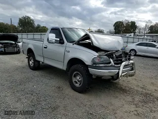 2004 Ford F-150 Heritage XL with VIN 2FTRF18284CA42951, listed as a Copart auction lot 79665784 with 160,293 mi miles and Salvage Title. Bid and sale history available at carsss.com. Image 11.