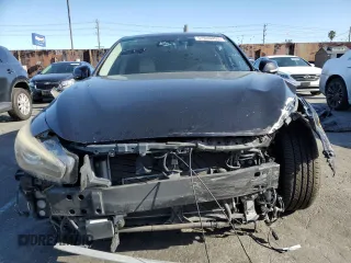 2014 Infiniti Q50 Hybrid Premium with VIN JN1AV7APXEM691616, listed as a Copart auction lot 51646095 with 133,670 mi miles and Clean Title. Bid and sale history available at DreamBid. Image 5.