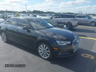 2017 Audi A4 Premium z VIN WAUGNAF42HN008791, wystawiony jako IAAI lot #42206696 z przebiegiem 101 527 mil mil oraz . Historia ofert i sprzedaży dostępna na DreamBid. Obrazek 1.