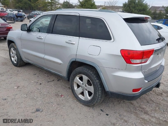 2011 Jeep Grand Cherokee Laredo with VIN 1J4RR4GG9BC718861, listed as a IAAI auction lot 41920517 with 144,245 mi miles. Bid and sale history available at carsss.com. Image 3.