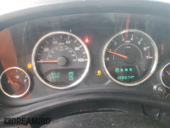 2015 Jeep Wrangler Unlimited Freedom with VIN 1C4BJWDG4FL568601, listed as a Copart auction lot 64041415 with 128,874 mi miles and Salvage title. Bid and sale history available at DreamBid. Image 9.