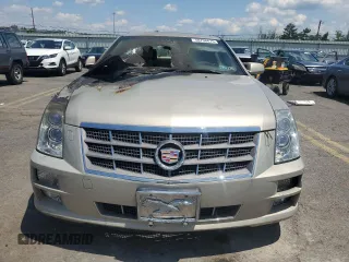 2009 Cadillac STS AWD z VIN 1G6DD67V390151523, wystawiony jako Copart lot #58758675 z przebiegiem Nie podano mil oraz Szkoda całkowita • Salvage title. Historia ofert i sprzedaży dostępna na DreamBid. Obrazek 5.