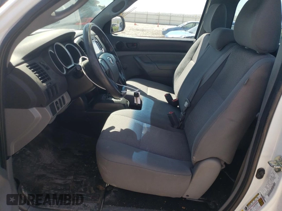 2014 Toyota Tacoma z VIN 5TFNX4CNXEX034493, wystawiony jako Copart lot #52005944 z przebiegiem 83 979 mil mil oraz Szkoda całkowita • Salvage title. Historia ofert i sprzedaży dostępna na DreamBid. Obrazek 7.