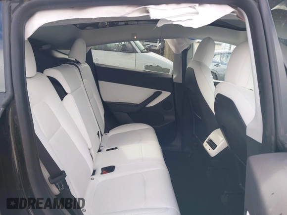 2022 Tesla Model Y Long Range z VIN 7SAYGDEE4NF447985, wystawiony jako IAAI lot #41811782 z przebiegiem 81 973 mil mil oraz . Historia ofert i sprzedaży dostępna na DreamBid. Obrazek 8.