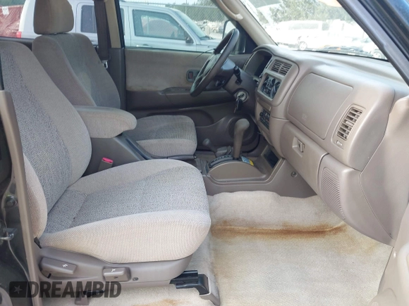 1999 Mitsubishi Montero Sport LS with VIN JA4MT31HXXP024168, listed as a IAAI auction lot 42064951 with 123,539 mi miles. Bid and sale history available at carsss.com. Image 5.