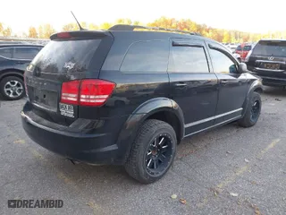 2018 Dodge Journey SE with VIN 3C4PDCAB8JT295146, listed as a IAAI auction lot 40641374 with 112,206 mi miles. Bid and sale history available at carsss.com. Image 4.