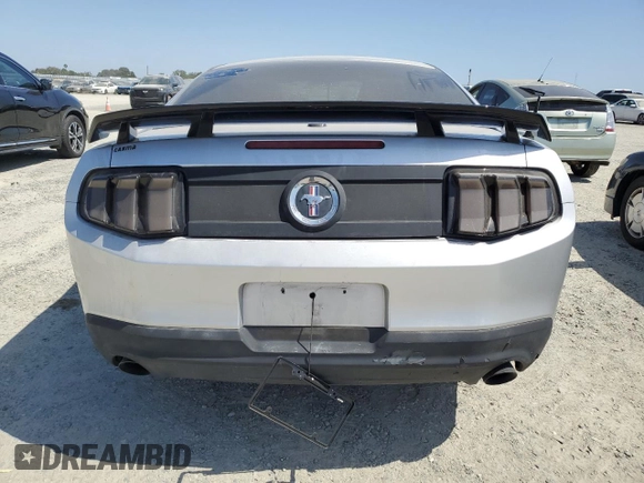2012 Ford Mustang Premium z VIN 1ZVBP8AM7C5237576, wystawiony jako Copart lot #60374995 z przebiegiem 123 061 mil mil oraz Szkoda całkowita • Salvage title. Historia ofert i sprzedaży dostępna na DreamBid. Obrazek 6.