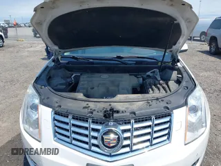 2013 Cadillac SRX Performance Collection z VIN 3GYFNDE35DS578495, wystawiony jako IAAI lot #42323061 z przebiegiem 160 473 mil mil oraz . Historia ofert i sprzedaży dostępna na DreamBid. Obrazek 10.
