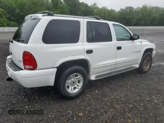 2001 Dodge Durango z VIN 1B4HS28Z21F570427, wystawiony jako Copart lot #58657475 z przebiegiem 114 295 mil mil oraz Tytuł czysty. Historia ofert i sprzedaży dostępna na DreamBid. Obrazek 3.