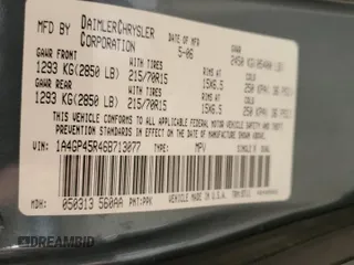 2006 Chrysler Town & Country with VIN 1A4GP45R46B713077, listed as a Copart auction lot 53140055 with 165,433 mi miles and Salvage Title. Bid and sale history available at DreamBid. Image 13.