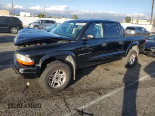 2002 Dodge Dakota Sport with VIN 1B7HG38N82S697439, listed as a Copart auction lot 44282155 with 239,414 mi miles and Salvage Title. Bid and sale history available at carsss.com. Image 1.