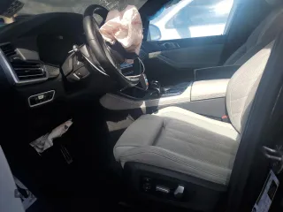 2023 BMW X5 xDrive40i with VIN 5UXCR6C07P9R18608, listed as a Copart auction lot 55911595 with Not provided miles and Salvage title. Bid and sale history available at DreamBid. Image 7.