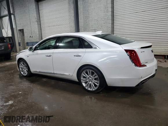 2018 Cadillac XTS Luxury with VIN 2G61N5S35J9122938, listed as a Copart auction lot 48697025 with 94,806 mi miles and Salvage title. Bid and sale history available at DreamBid. Image 2.