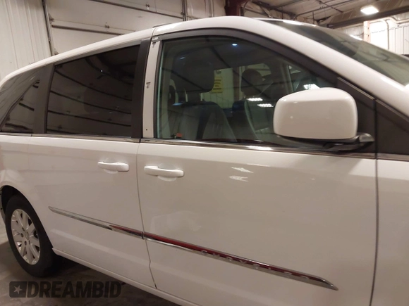 2016 Chrysler Town & Country Touring with VIN 2C4RC1BG1GR185657, listed as a IAAI auction lot 41905462 with 167,142 mi miles and . Bid and sale history available at DreamBid. Image 14.