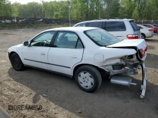 2000 Honda Accord LX z VIN 1HGCG1642YA080255, wystawiony jako Copart lot #53636855 z przebiegiem 146 478 mil mil oraz Szkoda całkowita • Salvage title. Historia ofert i sprzedaży dostępna na DreamBid. Obrazek 2.