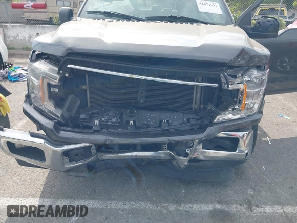2020 Ford F-150 XL with VIN 1FTEW1C46LKD28184, listed as a IAAI auction lot 42071631 with 131,629 mi miles and . Bid and sale history available at DreamBid. Image 6.
