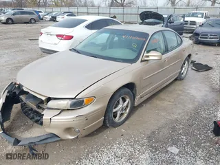 2003 Pontiac Grand Prix GT with VIN 1G2WP52K23F162669, listed as a IAAI auction lot 41467652 with 184,922 mi miles. Bid and sale history available at carsss.com. Image 2.