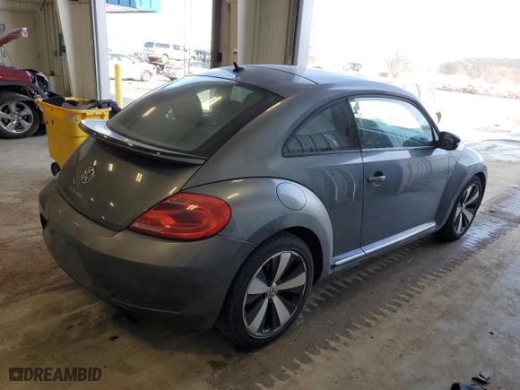 2012 Volkswagen Beetle 2.0T Turbo PZEV with VIN 3VWVA7AT1CM656081, listed as a Copart auction lot 43027995 with 63,802 mi miles and Clean Title. Bid and sale history available at carsss.com. Image 3.
