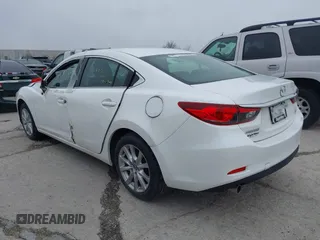 2015 Mazda 6 i Sport with VIN JM1GJ1U68F1170884, listed as a IAAI auction lot 39229424 with 99,317 mi miles. Bid and sale history available at carsss.com. Image 3.