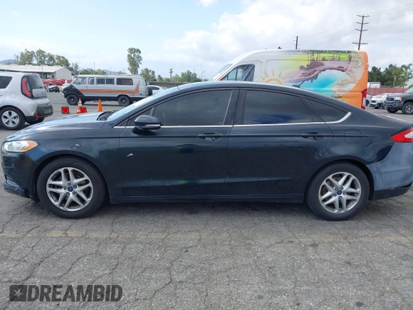 2014 Ford Fusion SE with VIN 3FA6P0H71ER317936, listed as a IAAI auction lot 42119522 with 206,220 mi miles. Bid and sale history available at carsss.com. Image 15.