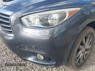 2013 Infiniti JX35 with VIN 5N1AL0MM3DC335827, listed as a IAAI auction lot 42038972 with 137,286 mi miles and . Bid and sale history available at DreamBid. Image 14.
