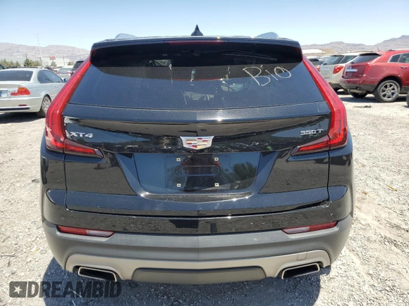2021 Cadillac XT4 FWD Premium Luxury с VIN 1GYFZCR4XMF004996, выставлен на аукционе Copart как лот 61270355 с пробегом Не указан миль и Списание • Salvage title. История ставок и продаж доступна на DreamBid. Изображение 6.