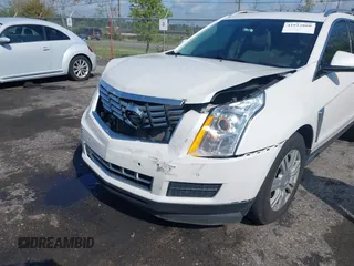 2013 Cadillac SRX Luxury Collection with VIN 3GYFNCE33DS608040, listed as a IAAI auction lot 41912860 with 128,295 mi miles and . Bid and sale history available at DreamBid. Image 6.
