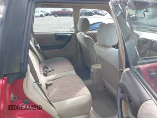 1999 Subaru Forester L with VIN JF1SF6357XH748358, listed as a IAAI auction lot 41885337 with 201,441 mi miles. Bid and sale history available at carsss.com. Image 8.