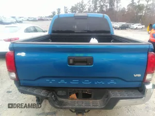 2018 Toyota Tacoma SR5 with VIN 3TMAZ5CN3JM066409, listed as a IAAI auction lot 41204775 with 75,000 mi miles and . Bid and sale history available at DreamBid. Image 16.