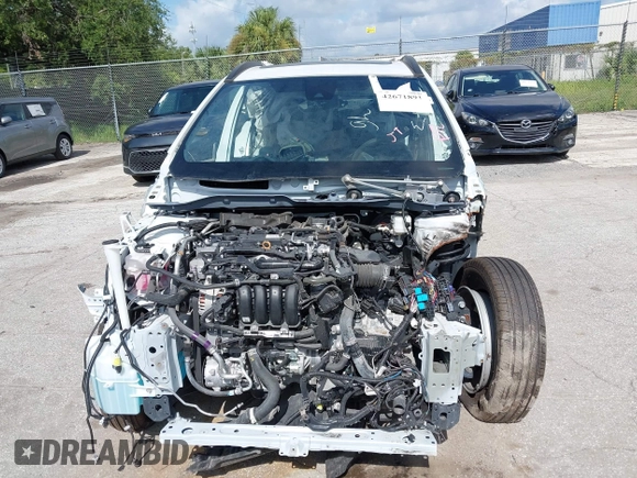 2022 Toyota Corolla Cross LE with VIN 7MUBAAAG9NV012455, listed as a IAAI auction lot 42671891 with Not provided miles and . Bid and sale history available at DreamBid. Image 6.