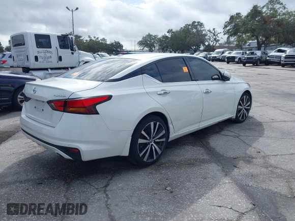 2020 Nissan Altima Platinum with VIN 1N4BL4FV0LC146255, listed as a IAAI auction lot 41043847 with 74,521 mi miles and . Bid and sale history available at carsss.com. Image 4.
