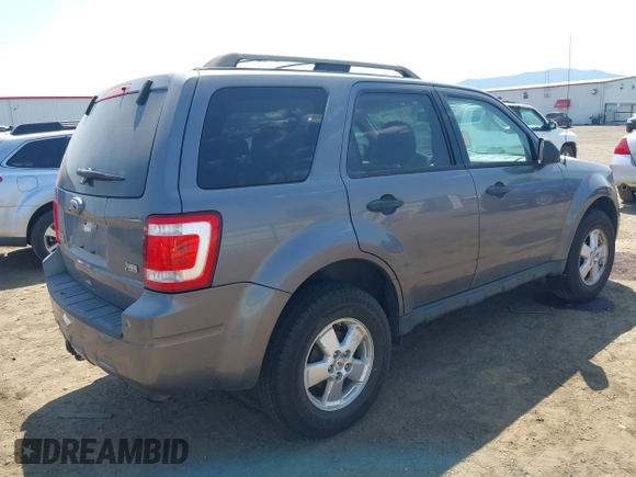 2011 Ford Escape XLT with VIN 1FMCU9DG4BKA07985, listed as a IAAI auction lot 42510948 with 125,126 mi miles and . Bid and sale history available at DreamBid. Image 4.