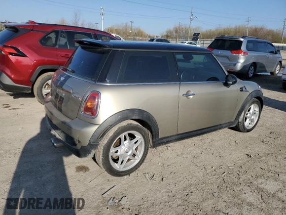 2009 MINI Hardtop S with VIN WMWMF73529TW82713, listed as a Copart auction lot 51152035 with 170,954 mi miles and Salvage title. Bid and sale history available at DreamBid. Image 3.