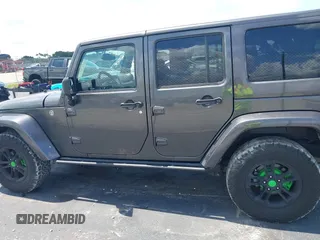 2017 Jeep Wrangler Unlimited Sahara with VIN 1C4BJWEG2HL612421, listed as a IAAI auction lot 42355409 with 81,708 mi miles and . Bid and sale history available at DreamBid. Image 14.