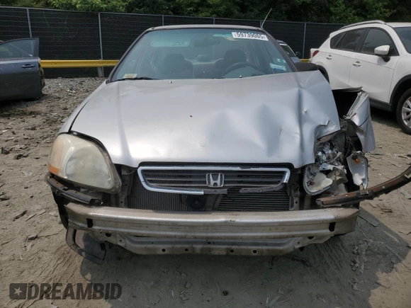1997 Honda Civic LX z VIN 2HGEJ6677VH573069, wystawiony jako Copart lot #59739065 z przebiegiem 287 987 mil mil oraz Szkoda całkowita • Salvage title. Historia ofert i sprzedaży dostępna na DreamBid. Obrazek 5.