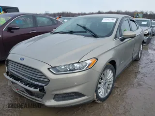 2015 Ford Fusion S Hybrid with VIN 3FA6P0UU4FR111409, listed as a IAAI auction lot 41447316 with 150,068 mi miles. Bid and sale history available at carsss.com. Image 17.