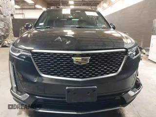 2020 Cadillac XT6 AWD Premium Luxury with VIN 1GYKPDRSXLZ111021, listed as a IAAI auction lot 37922511 with 54,755 mi miles and . Bid and sale history available at DreamBid. Image 12.