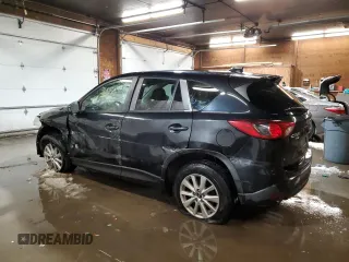 2015 Mazda CX-5 Touring with VIN JM3KE4CY1F0458911, listed as a Copart auction lot 87666255 with 0 mi miles and Salvage Title. Bid and sale history available at carsss.com. Image 2.
