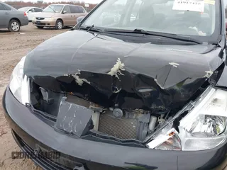 2011 Nissan Versa 1.8 S with VIN 3N1BC1AP7BL378133, listed as a IAAI auction lot 41917425 with 124,228 mi miles. Bid and sale history available at carsss.com. Image 6.